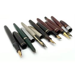 A Croxley Dickinson fountain pen, with black resin body, lever fill action and nib marked 14ct, together with two Waterman's pens, comprising a 502 with black resin body, lever fill action and nib marked 14ct, and an Argent Massif with engine turned decoration to body and nib marked 18K, an Osmiroid fountain pen with burgundy resin body and lever fill action, two further fountain pens, and a propelling pencil. (7). 