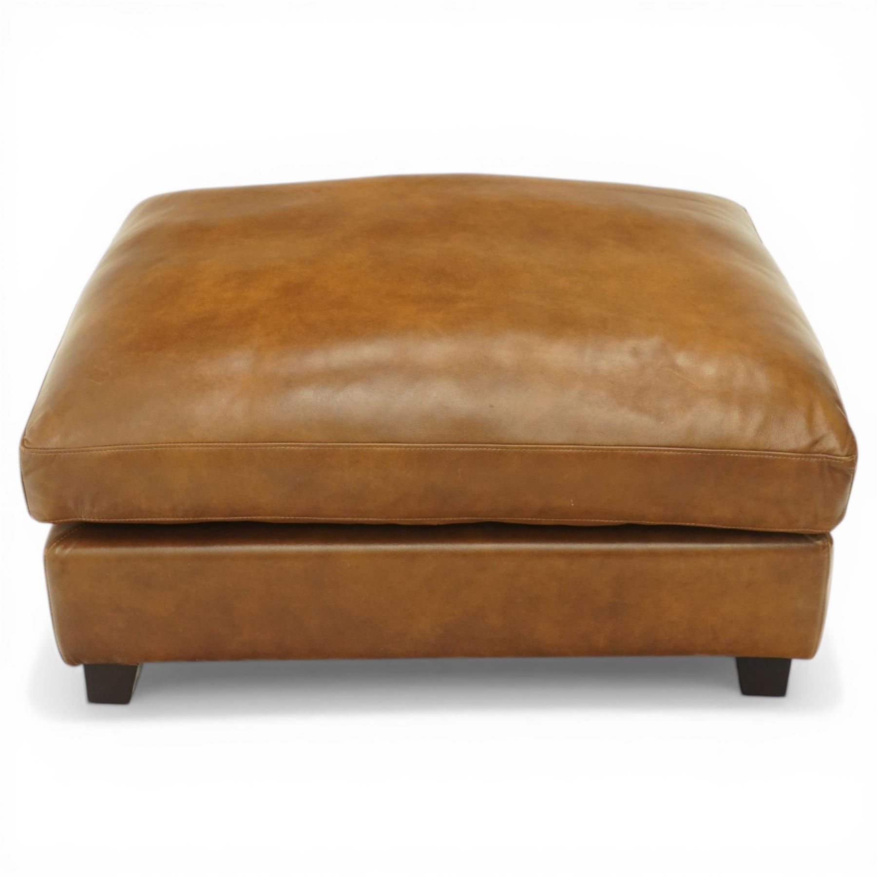 Laura Ashley - late 20th century pouffe footstool of rectangular form, loose seat cushion and base upholstered in chocolate brown leather, on ebonised square tapering feet