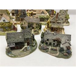 Eight Lilliput Lane limited edition Beatrix Potter models, including Buckle Yeat, Tabitha Twitchits Shop and Ginger Pickles Shop, together with twelve Lilliput Lane models from the Blaise Hamlet collection, including Dial Cottage, Diamond Cottage and Vine Cottage, all with deeds and original boxes (20)