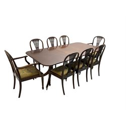 Georgian design mahogany dining table, rectangular moulded top with rounded corners, turned pedestal on moulded splayed supports with brass cups and castors, with additional leaf (W202cm, H73cm, D107cm); together with eight Edwardian mahogany dining chairs, arched cresting rail over pierced splat back, upholstered drop in seats