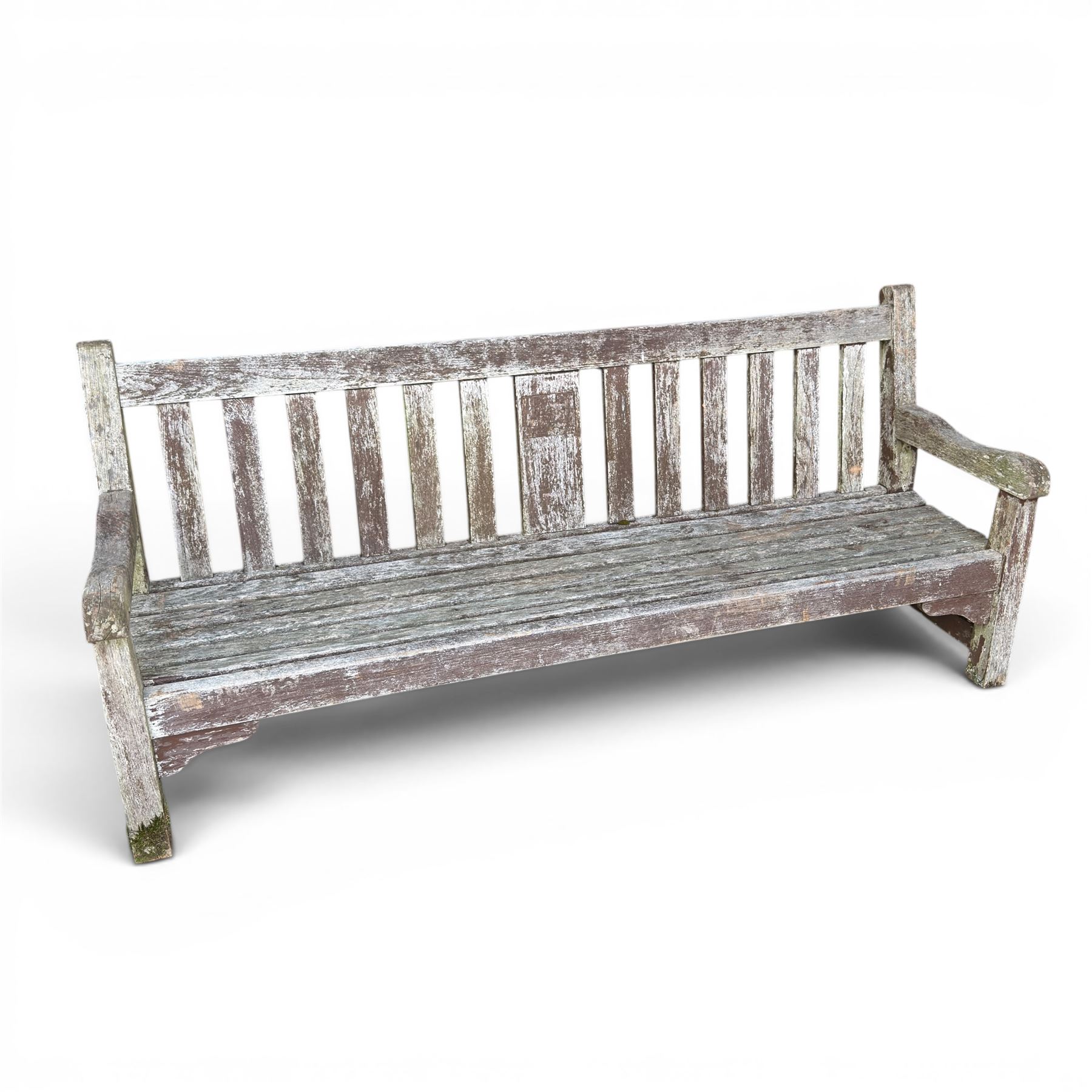 Teak garden bench with slatted back and seat on square supports in weathered which finish 