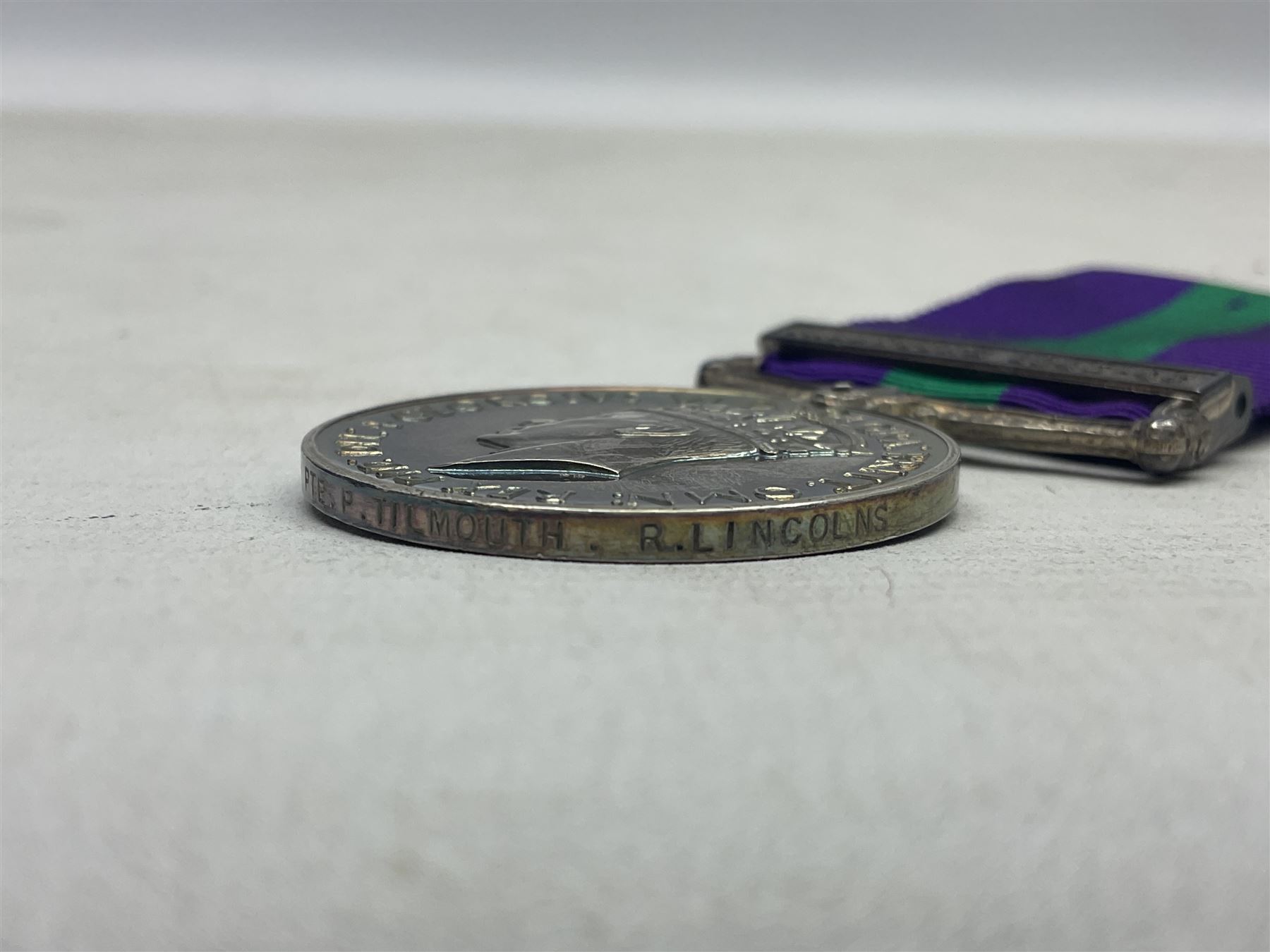 George VI General Service Medal with Palestine 1945-48 clasp awarded to 19117460 Pte. P. Tilmouth R. Lincolns; with ribbon