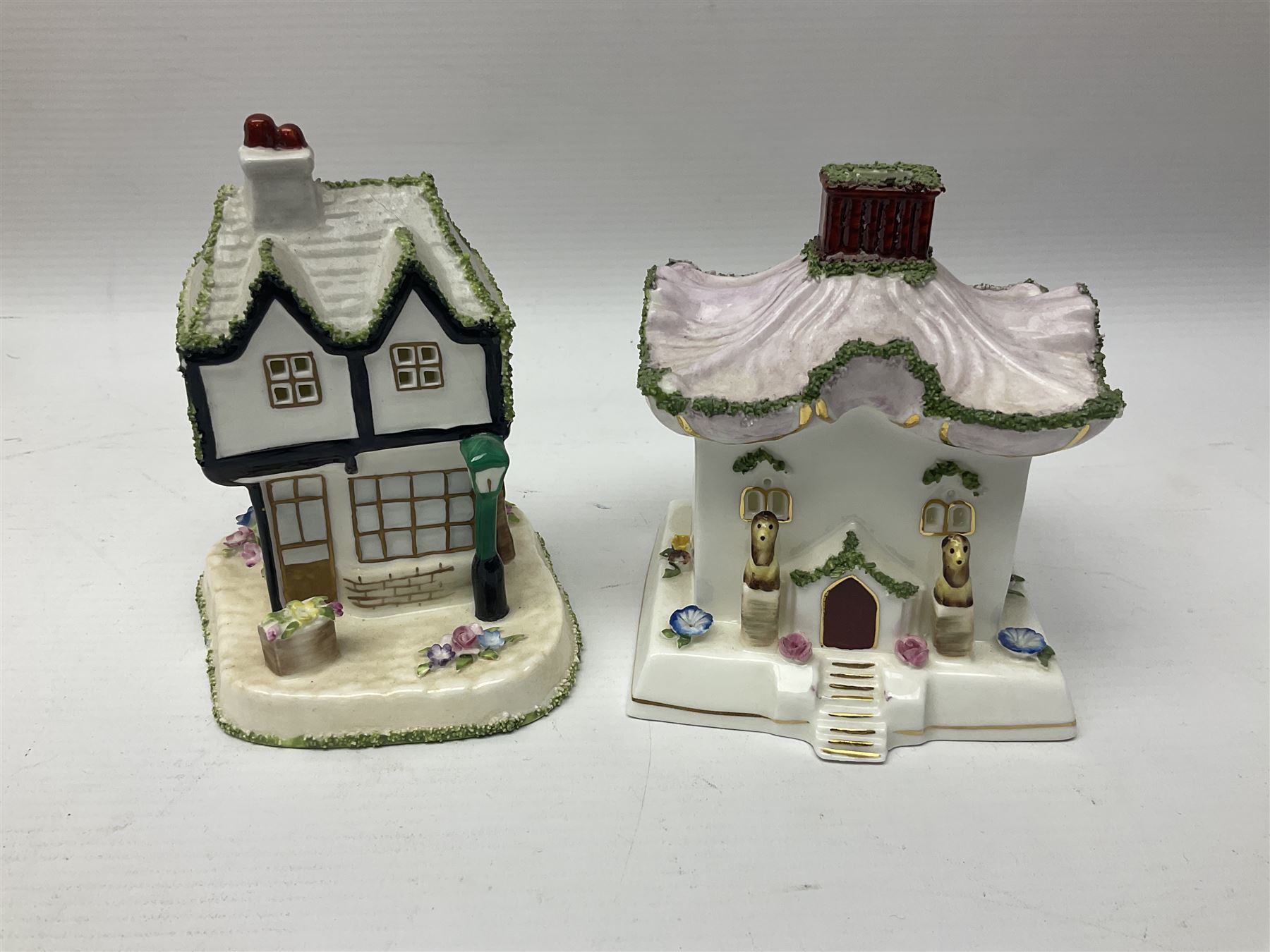 Eleven Coalport cottages, including Park Folly, The Alms House, Watermill and The Summer House, each with printed marks beneath