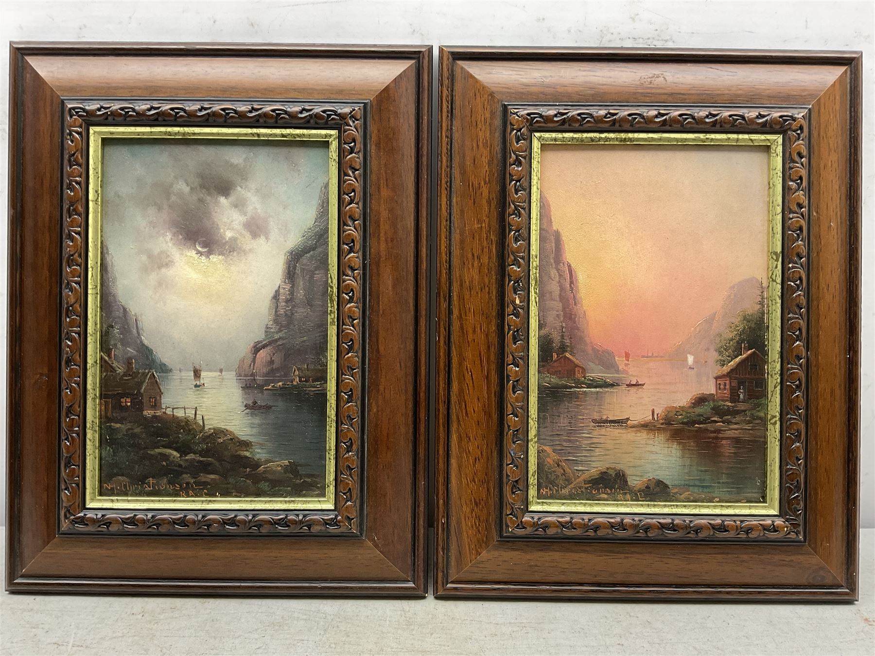 Nils Hans Christiansen RAC (Danish 1850-1922): River Valleys at Dusk, pair oils on board signed 22cm x 14cm (2)