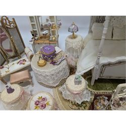 Dolls house bedroom and dressing room furniture, including beds, wardrobe, dressing table, lamps, tables, two figures and a collection of accessories