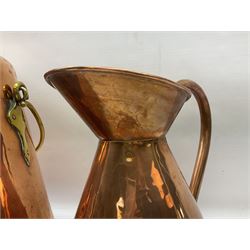 Art Nouveau copper and brass lidded coal bucket, the tapering body with brass urn shaped finial and swing carrying handle raised upon three feet, together with a copper flagon, tallest H34cm