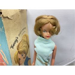 1960s Palitoy Tressy fashion doll, boxed with stand and booklets; four additional Tressy outfits (In The Office, Winter Journey, Winter Sports and Evening Date); two other outfits; and Tressy's Little Sister Toots doll with Style Book and additional outfit
