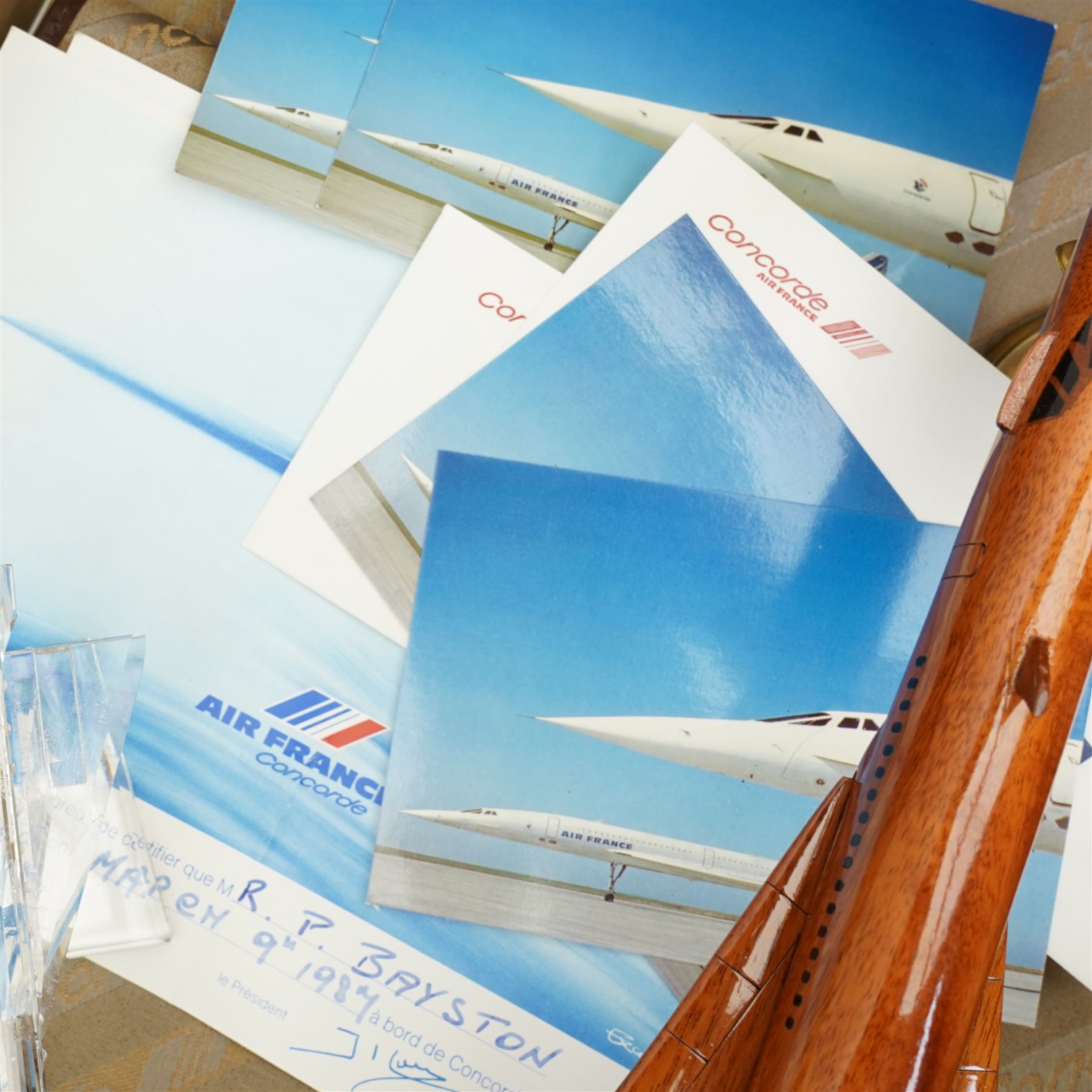 Concorde related memorabilia, including various models, stamps, fabric cases, luggage tags etc