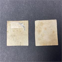 Two Great Britain Queen Victoria penny black stamps, both with red MX cancels