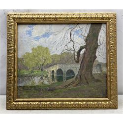 Thomas La Dell (British 1883-1971): Country Park with Stone Bridge, oil on canvas board signed 41cm x 49cm 
Notes: Thomas was the father of Thomas Edwin La Dell ARA (1914-1970), he is listed as a 'Sheffield-born bookbinder' and 'still life painter' along with his wife Ellen. He exhibited at the Royal Academy between 1949-1967; his inaugural exhibit in 1949 was entitled 'The Old Elm' (No.938), which, owing to the James Bourlett label verso, may well be the present lot