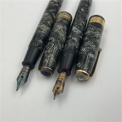 Conway Stewart Executive 60 fountain pen, the barrel and cap with hatched grey and black marble decoration and gold nib stamped Duro 14ct, together with a Conway Stewart 58 fountain pen similarly decorated in pearl blue and black with gold nib stamped 14ct, largest 13cm (2)