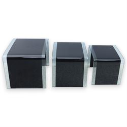 Nest of three contemporary glass occasional tables, black glass centres with  clear glass borders 