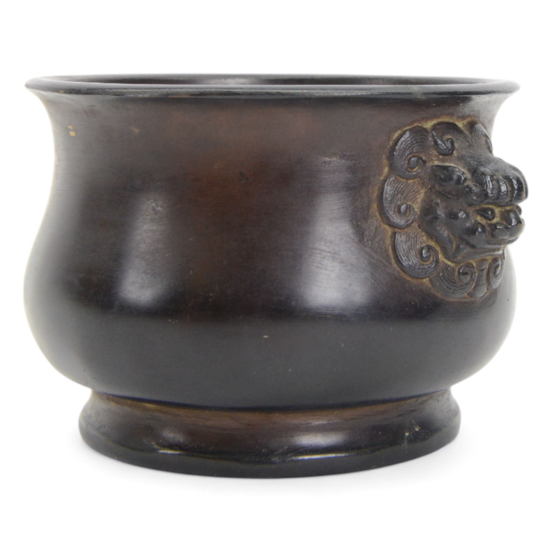 Chinese bronze censer, of circular bellied form with temple lion mask handles, upon a circular foot, with apocryphal six character Xuande mark within a border of two dragons chasing a pearl, H7.5cm D10/5cm
