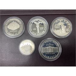 Five United States of America commemorative silver proof coins, comprising 1986, 1987, 1989, 1992 one dollars and 1982 half dollar, all with certificates