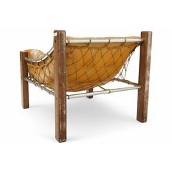 Jean Gillon (Romanian/Brazilian 1919-2007): 'Amazonas' easy chair, mahogany framed with slung leather upholstered cushions, together with matching footstool