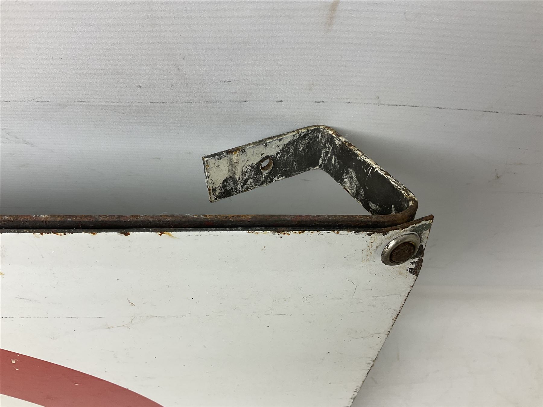 Enamel station sign for Charing Cross in red and blue on a white ground 56 x 71cm with hanging brackets