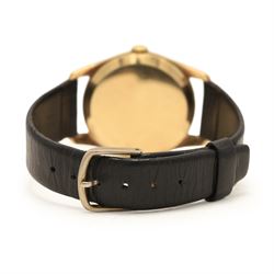 Omega gentleman's 9ct gold manual wind wristwatch, Ref. 923, Cal. 268, silvered dial with dagger and Arabic hour markers and subsidiary seconds dial, Birmingham 1961, on black leather strap