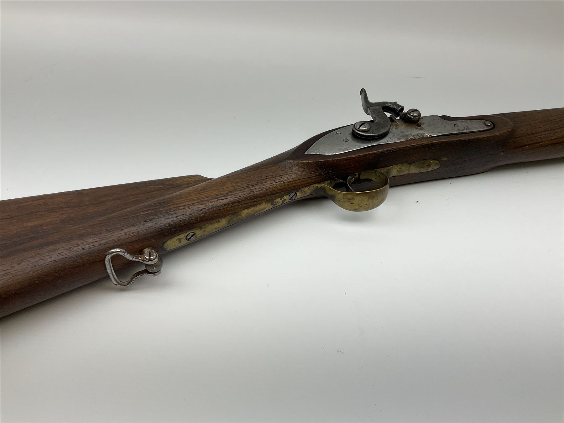 Reproduction 11-bore black-powder blunderbuss, the 61.5cm barrel with black-powder marks and ramrod under, walnut full stock with steel lock and brass fittings and two sling swivels, serial no.155, L101cm overall SHOTGUN CERTIFICATE REQUIRED