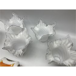 Milk glass lampshade decorated with peacocks, together with a Tiffany style lampshade, a set of five white frilled lamps shades etc 