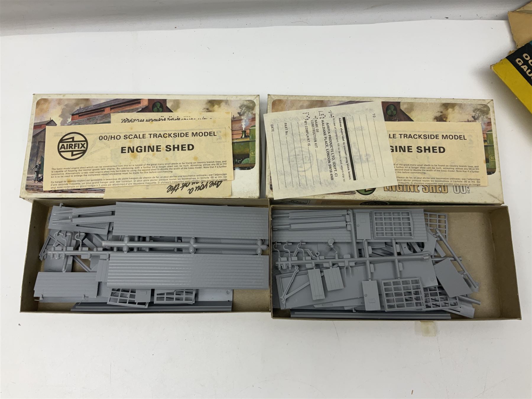 '00' gauge trackside accessories including Metcalfe kits for Platform, Goods Shed and Signal box, Superquick locomotive shed, Airfix kits for locomotive, wagons and buildings etc, Dapol Station Accessories and Turntable, six Parkside Dundas wagon kits, Hornby Footbridge etc; most boxed or packaged