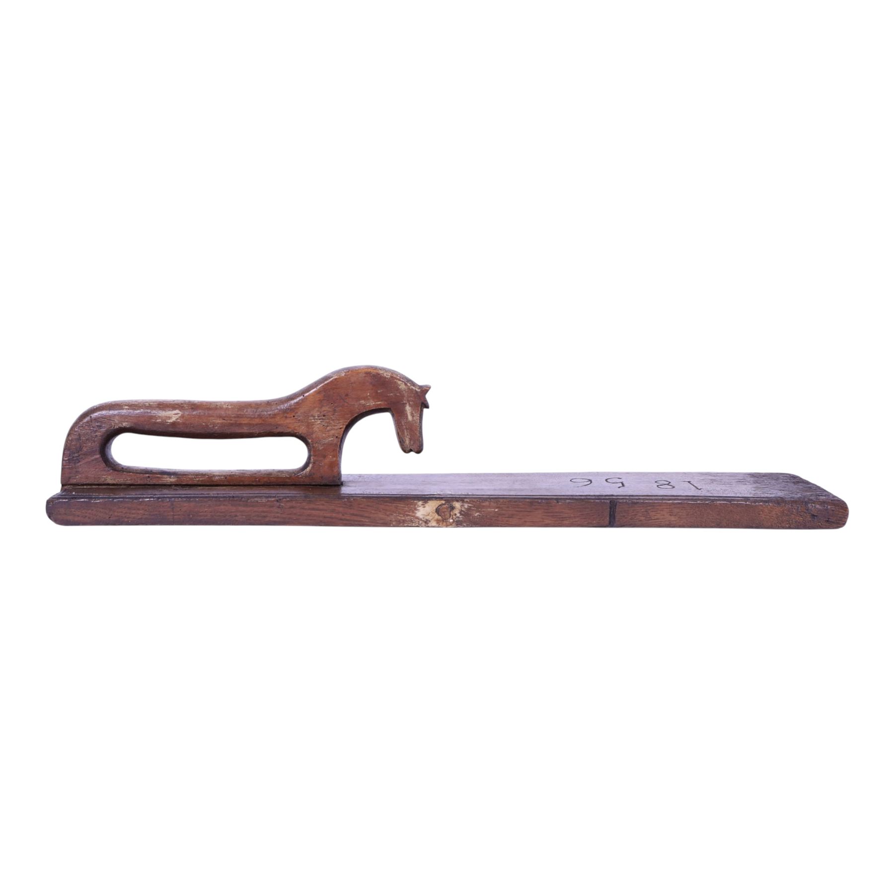Mid 19th century Norwegian carved mangle board, dated 1856, of rectangular form with stepped edges, and carved dala horse handle, L63cm