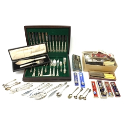 A canteen of Community plate cutlery for six place settings, together with a cased set of silver plated fish servers, a selection of silver plated and other flatware, and various silver plated and other souvenir spoons. (Qty). 