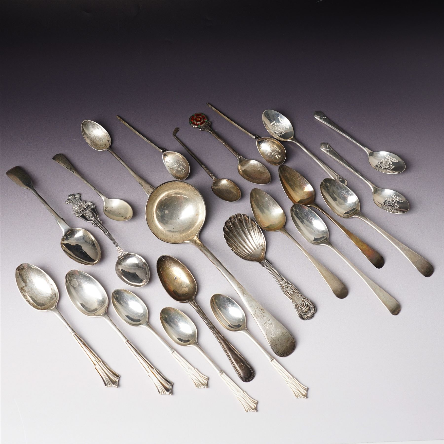 Quantity of assorted silver cutlery including sauce ladle, Victorian caddy spoon, various teaspoons, golf club spoons etc
