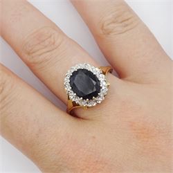 9ct gold oval cut sapphire and diamond cluster ring, hallmarked