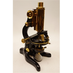  20th century black japanned & lacquered brass monocular 'Patna' Microscope, outfit 16603, stamped W.Watson & Sons Ltd. London No.71476, with rack & pinion coarse and fine adjust, three objective turret on horse shoe base, in fitted mahogany case with additional objective, filters etc, with original receipt for 1940, H32cm, case H42cm    