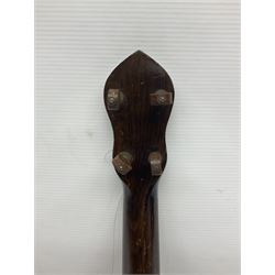 George Formby banjolele with metal plaque to headstock L55cm; in carrying case with instruction booklet.