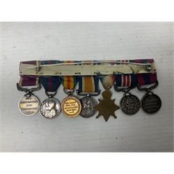 George V Military Medal and Distinguished Conduct Medal miniature group of seven medals comprising MM, DCM, WW1 trio including 1914 Star with date clasp and MID leaves, The Great Durbar Delhi 1911 Medal and LSGC; on pinned wearing bar; WW1 Military Medal miniature group of three comprising MM, BWM and Victory; Victoria North West Canada 1885 miniature; and George VI miniature Territorial Efficiency medal; all with ribbons