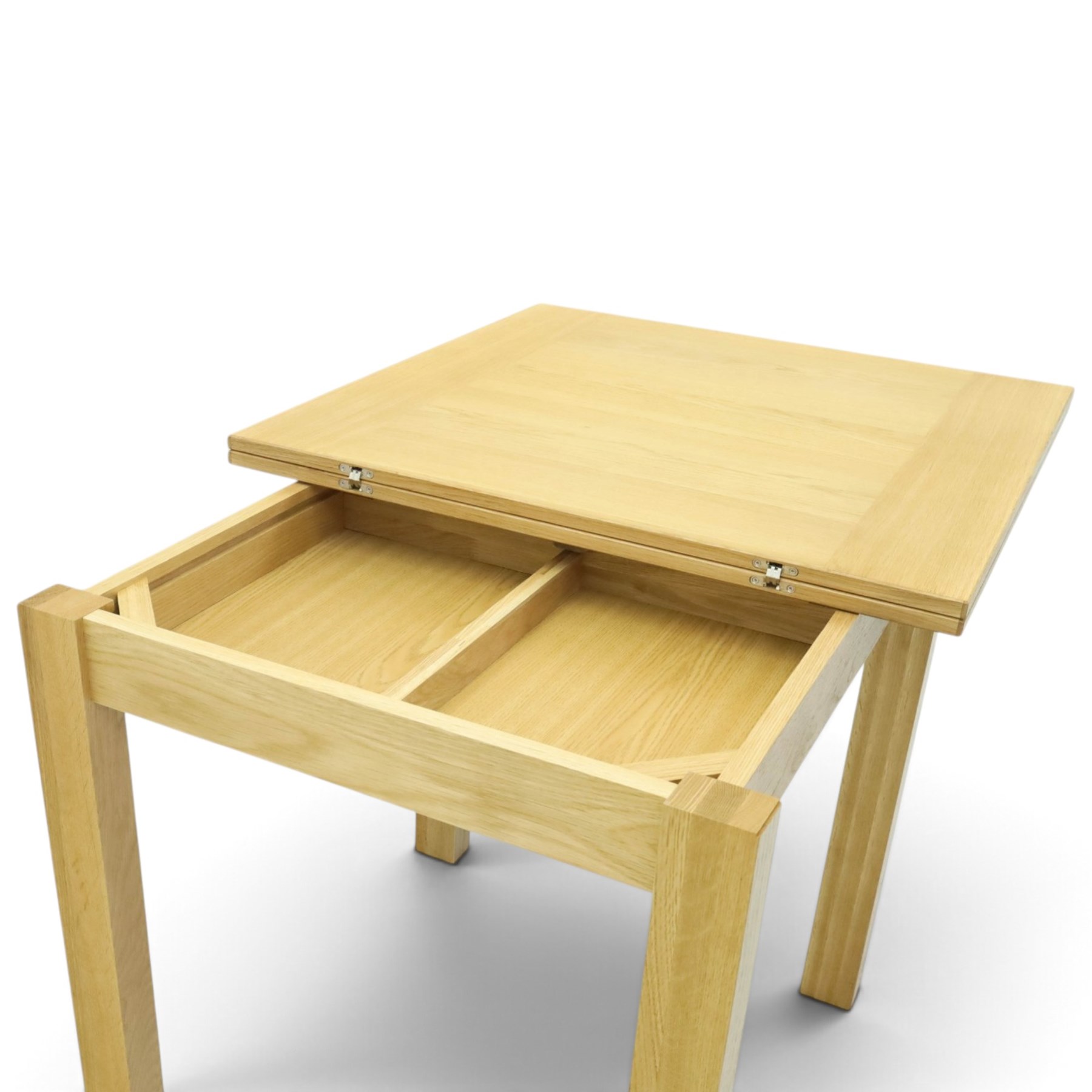 Contemporary light oak extending dining table, the square top with pull-out and fold-over action, raised on square supports