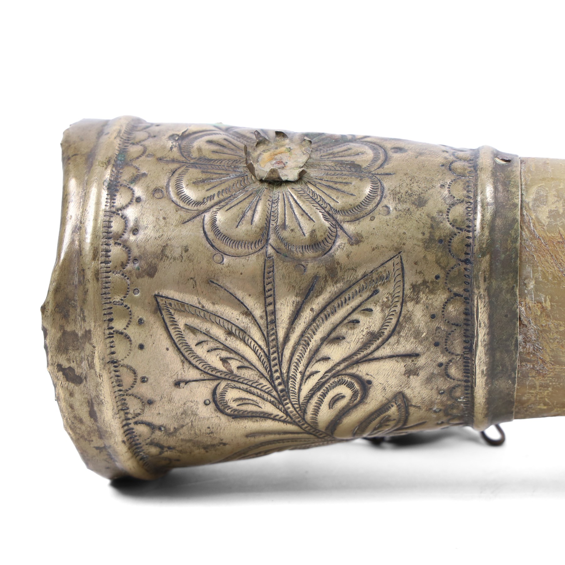 Horn powder flask, with metal mounts embossed with foliate decoration, L40cm