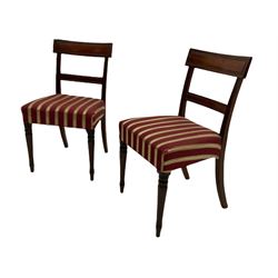 Set five 19th century mahogany dining chairs, moulded rectangular cresting rails over matching middle rails, reed carved upright supports, seats upholstered in striped fabric, on turned front supports, four side chairs and one carver 