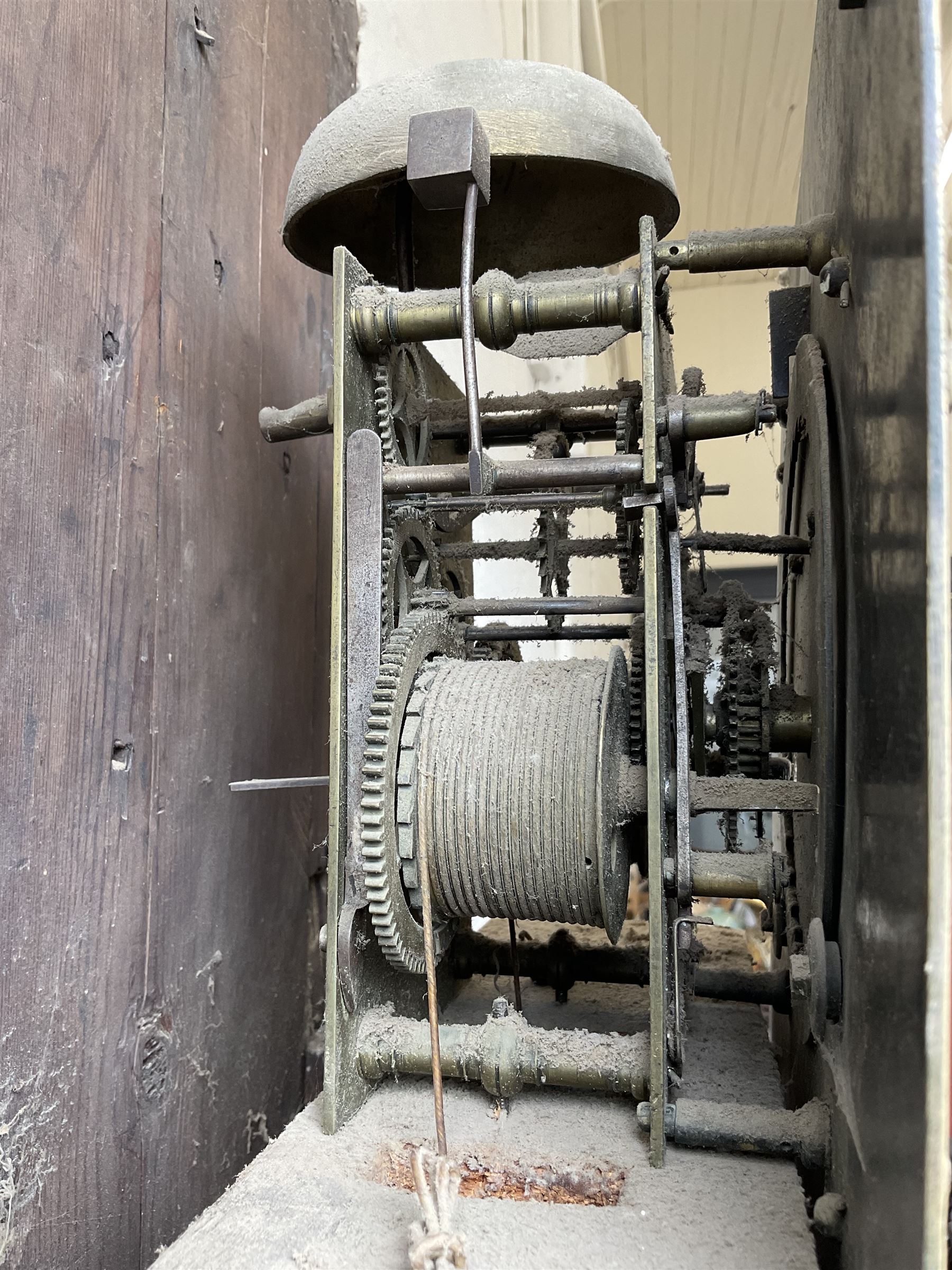 Robert Henderson of Scarborough -mid-18th century eight-day longcase clock c1750, with a flat topped pediment and broad cornice, carved frieze beneath and a square hood door flanked by detached pilasters with gesso capitals, profusely carved trunk with a break arch topped door on a square plinth raised on a shaped base, brass dial with a matted and engraved dial centre, cast spandrels and chapter with Roman numerals and five minute Arabic's, with a seconds dial and date aperture, dial pined directly to a rack striking movement with a recoil anchor escapement, sounding the hours on a bell. With weights and pendulum.
Robert Henderson was one of the first clockmaker recorded as working in Scarborough, b1678-d1756.

