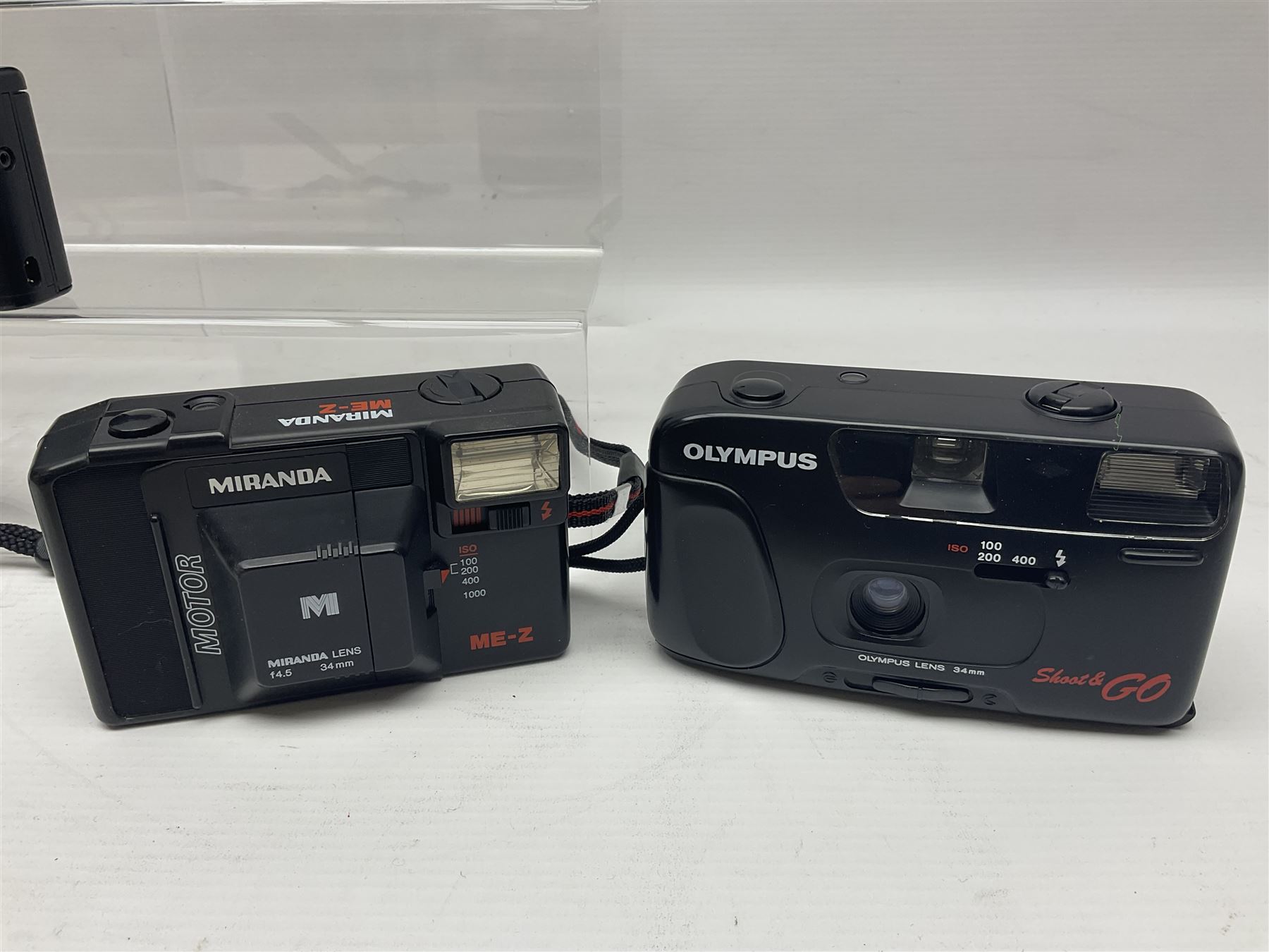 Four Olympus cameras, to include AF10 Super, XA2, Shoot & Go and Supertrip examples, together with Miranda ME-Z and Miranda ME-X DX cameras, an Agfa Optima camera with Agfa Paratonic DIN ASA Solitar 1:2.8/40 lens, Canon Snappy S camera and a Fujifilm Fine Pix S5700 camera, serial no 7WE12368 (8)