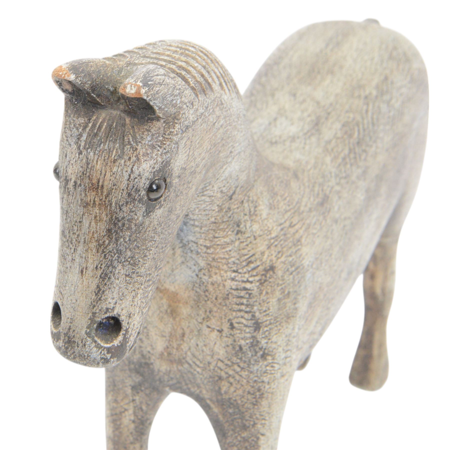 Carved Folk Art wooden horse, with glass eyes, H33cm
