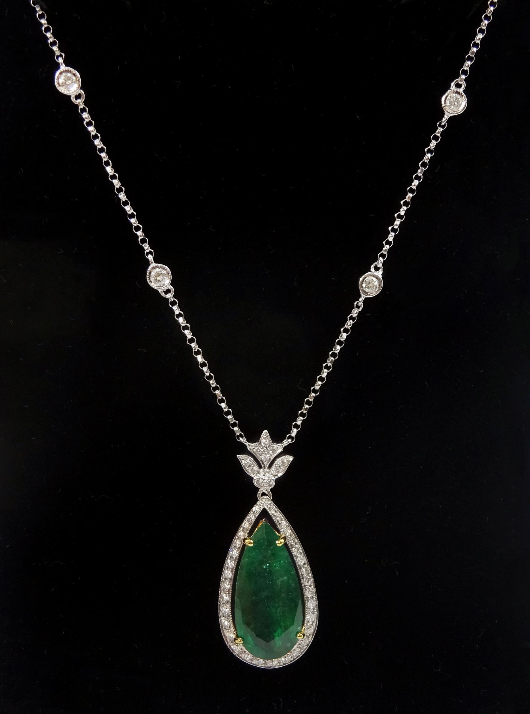 18ct white and yellow gold emerald and diamond necklace, the pear ...
