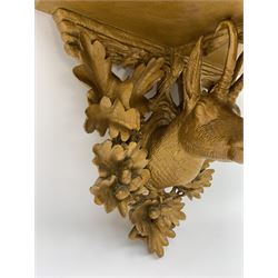 Late 20th century carved giltwood wall bracket, the shaped top with carved support in the form of a deer amidst oak leaves and acorns, H33.5cm