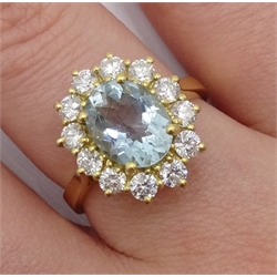 18ct gold oval aquamarine and diamond cluster ring, hallmarked, aquamarine approx 1.60 carat,m diamond total weight approx 0.90 carat