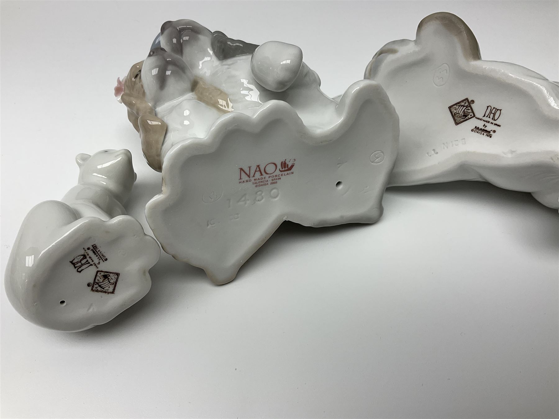 Ten Nao figures, to include three Cheeky Cherubs, Cat, Dog bride and groom etc