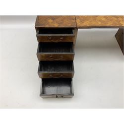 Japanese miniature kneehole desk decorated with parquetry inlay, the loose leaf top resting on one pedestal cabinet with four drawers, and another with hinged cupboard door opening to reveal two interior drawers above a lower drawer, H26cm, W68.5cm D24cm