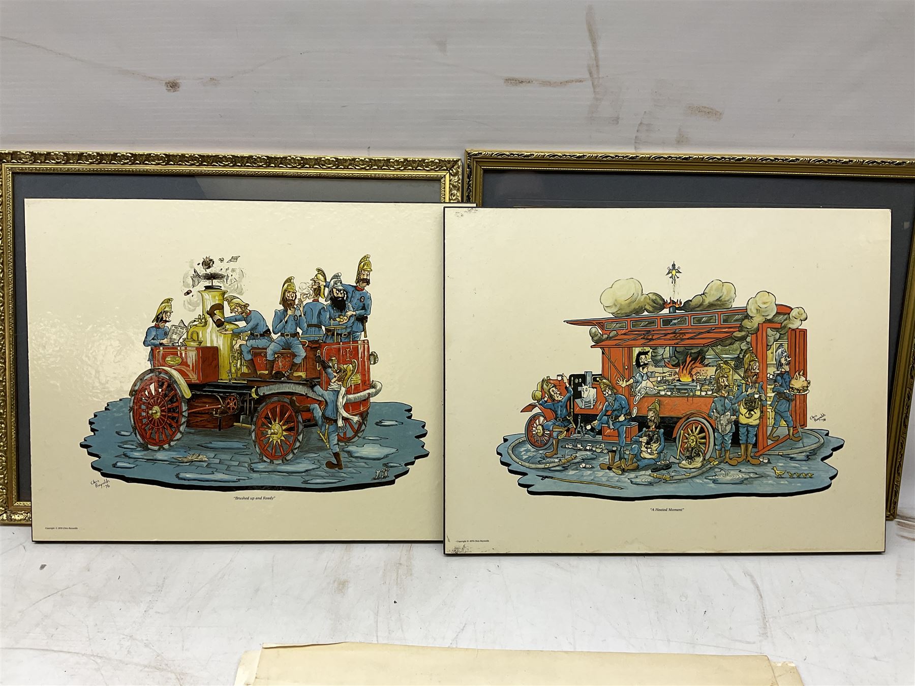 Set of four framed coloured prints humorous fire brigade related, after Chris Reynolds, together with Brooke bond picture cards, to include Asian wild life, the race into space, travel through the ages etc