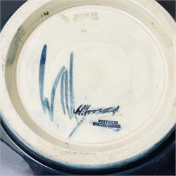 William Moorcroft African Lily pattern bowl, on a green ground, blue signature mark to base, D22cm