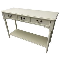 Laura Ashley - 'Clifton' ivory finish three drawer console table, fitted with three frieze drawers with heavily moulded edges, raised on turned supports united by undertier