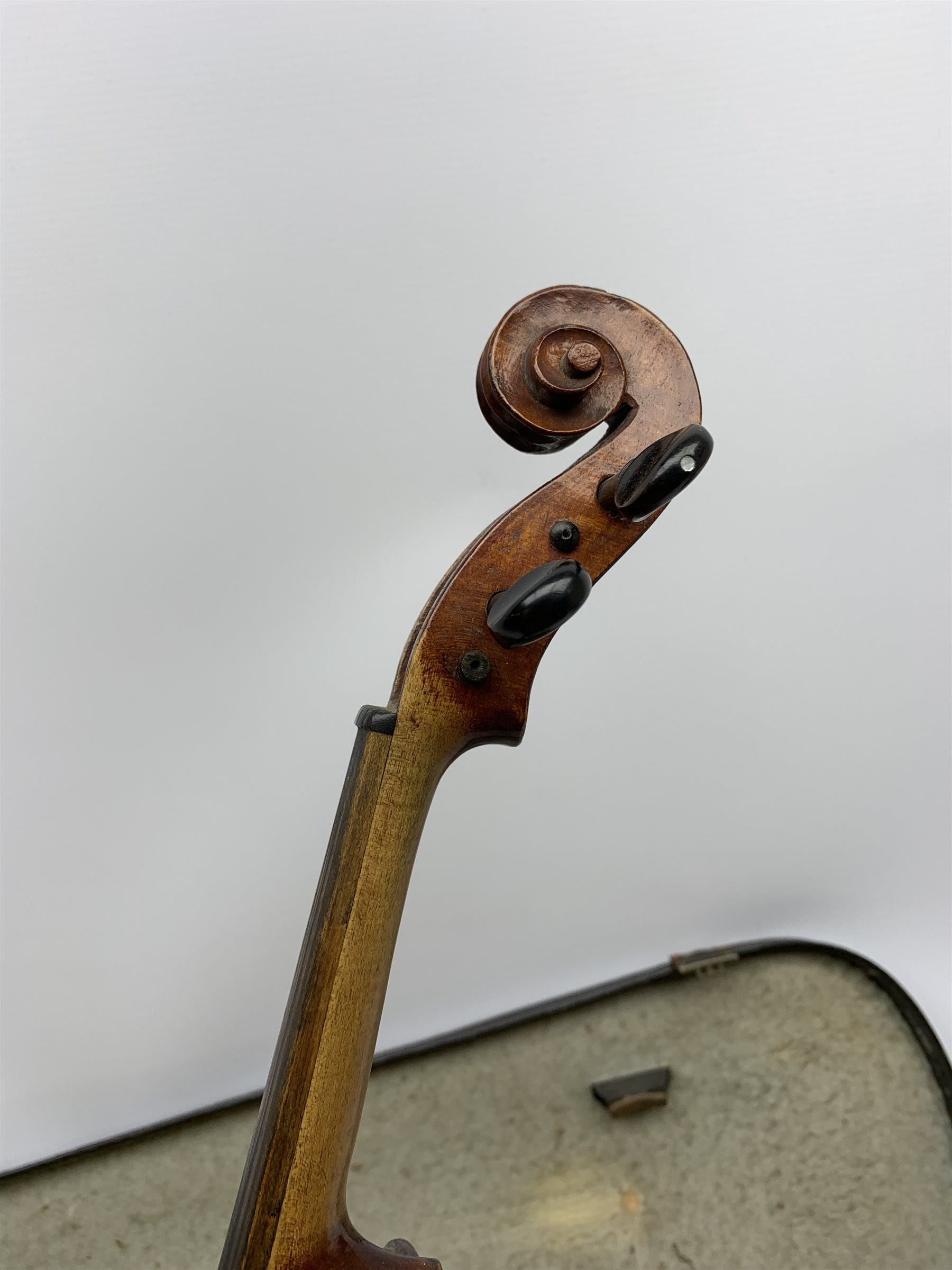 1920s German violin for completion with 36cm two-piece maple back and ribs and spruce top, lacks tailpiece, bridge and strings, 59cm overall, in carrying case