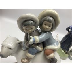 Lladro figure Eskimo Riders no 5353, two Royal Copenhagen figures, girl with calf, no 779 and girl with goose no 528, all with printed marks beneath, Lladro H18cm 