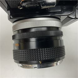 Canon F1n camera body, serial no. 572972, with 'Canon FD 50mm 1:1.4' lens, serial no. 246665, with leather case 