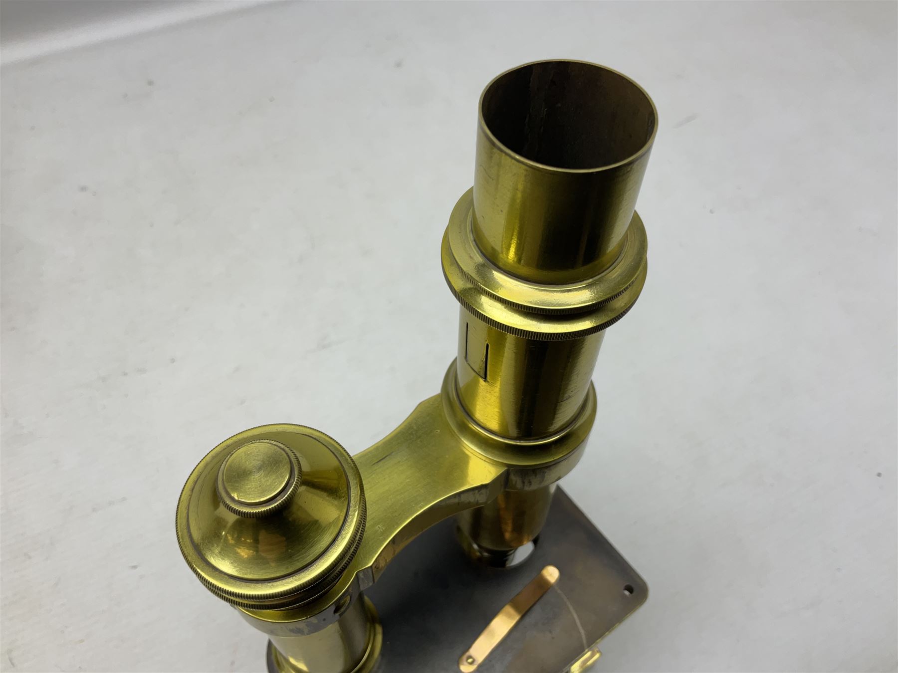 19th century brass monocular microscope by R. & J. Beck London No.18760 with hinged column and pitchfork base H25cm; in fitted mahogany case with two lenses