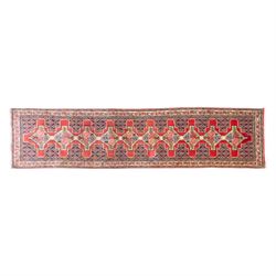 North West Persian Senneh hand-knotted runner, field with a central stepped medallion desi...